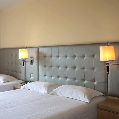Qingdao Renjia Bussiness Hotel מראה חיצוני תמונה